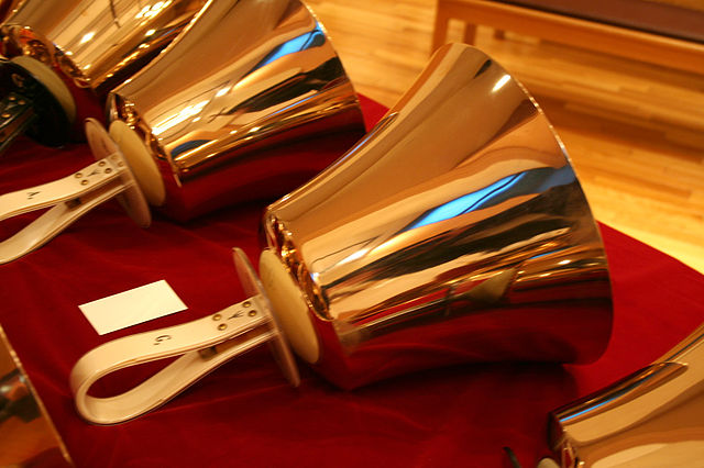 Hand bells lying on their side